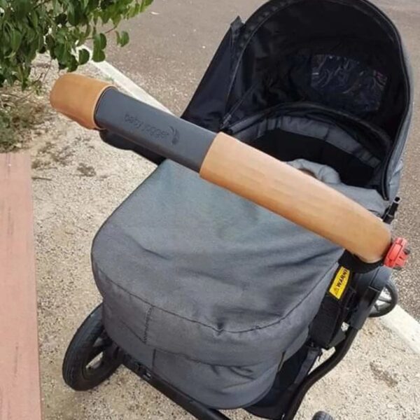 Customer photo: pram with a cognac leather handlebar cover by Re-Covers