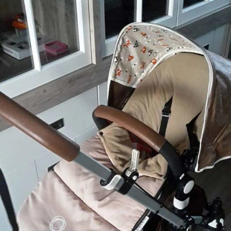 Customer photo: pram with brown leather handlebar and bar covers by Re-Covers