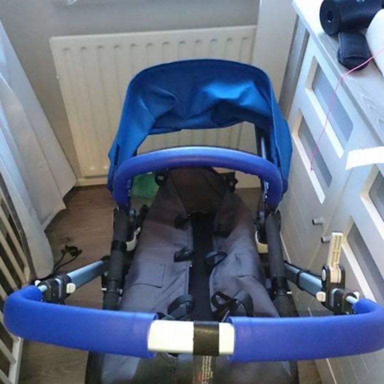 Customer photo: pram with a blue leather bumper bar cover by Re-Covers